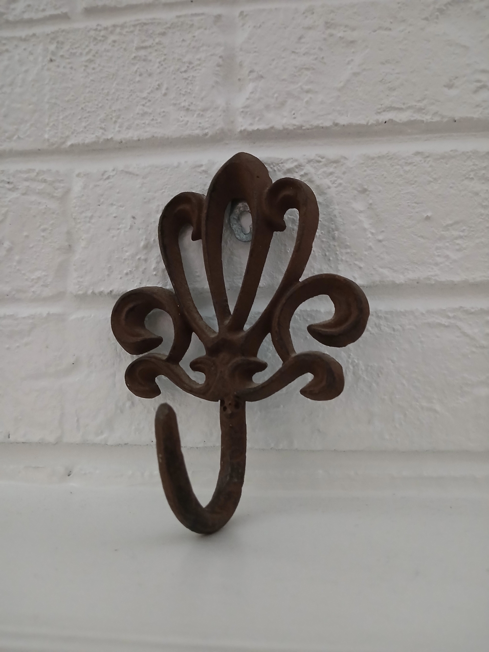 Cast Iron Decorative Fleur-de-Lis Wall Hook in Brown